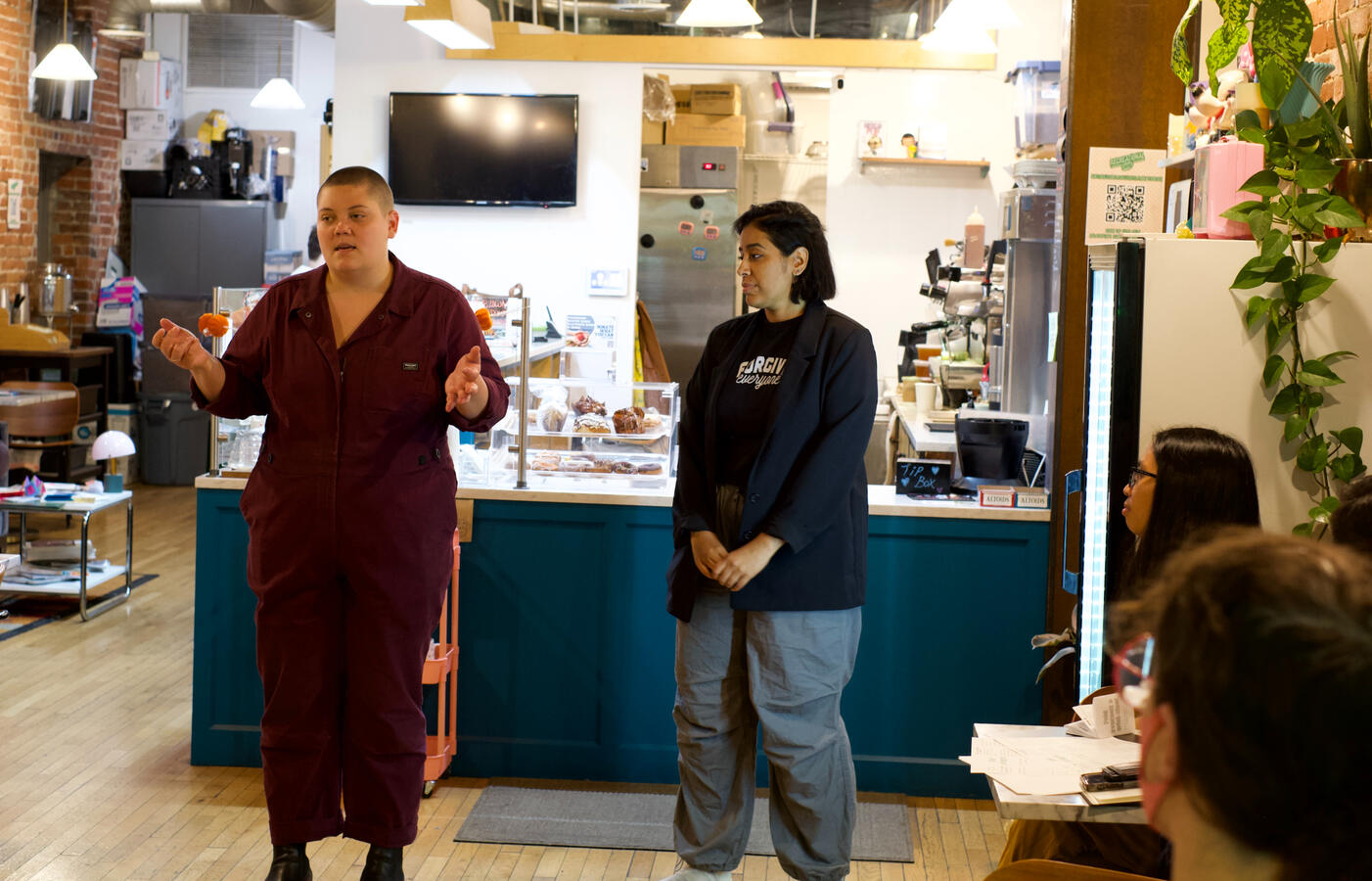 Zine workshop at Recreational Coffee Evan teaching a zinemaking workshop
